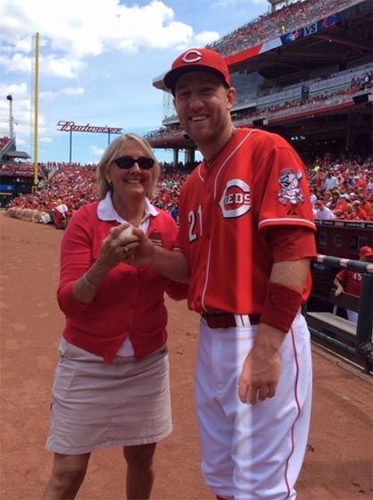 Louise Borden with Reds player Todd Frazier